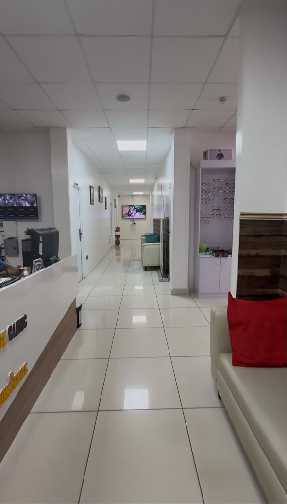 Patient lounge beside the eye care display at Diplomatic Village Clinic